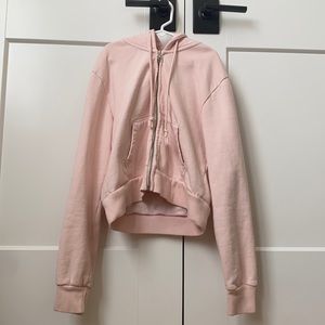 Light pink cropped brandy Melville zip up hoodie.
